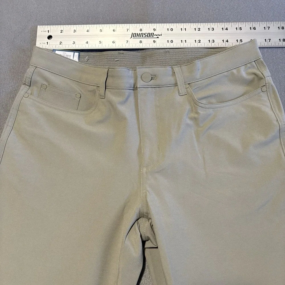 Greg Norman Tech Pants Men 32x34 Green Performance Golf Travel 4-Way Stretch NEW